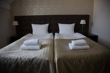 Фото номера Двухместный номер с 1 кроватью или 2 отдельными кроватями Отель Hotel Oriza г. Гдув 27